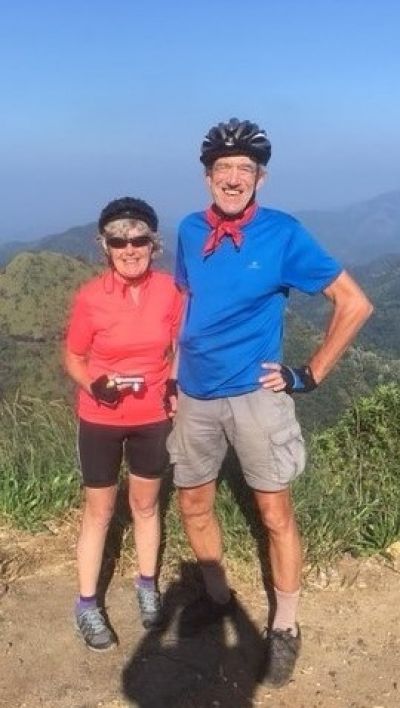 Pete & Judy Burdett Cycling on the  tour with redspokes